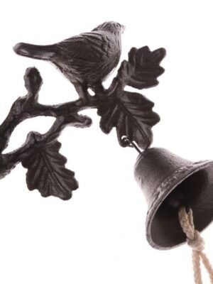 Żeliwny dzwonek z ptakiem