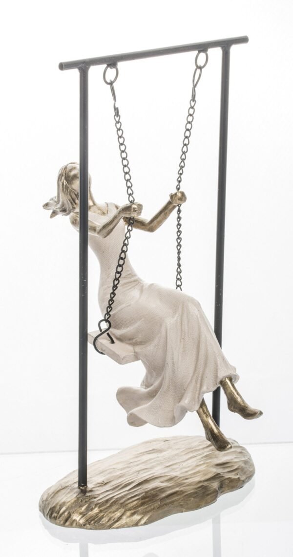 Figurka złota kobieta dziewczyna na huśtawce 26x20