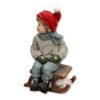 Chłopczyk na sankach figurka ceramiczna